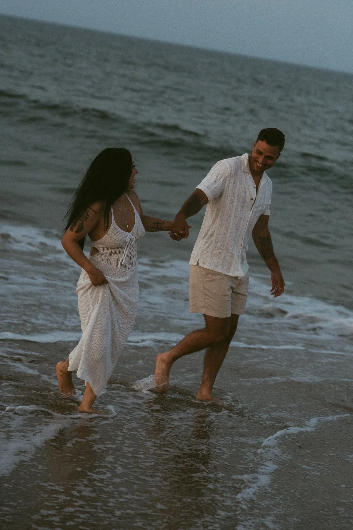 Bride and groom on Fort story beach in Virginia Beach, Va