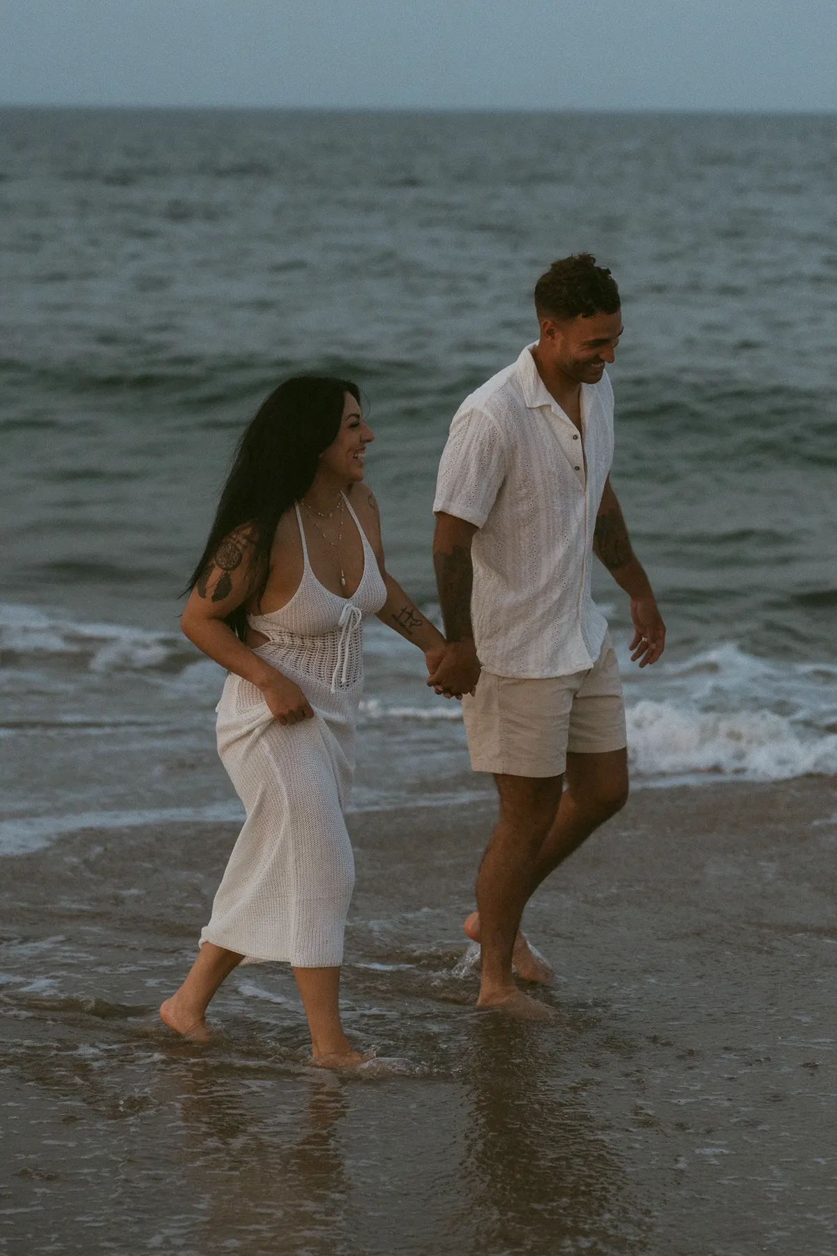 Bride and groom on Fort story beach in Virginia Beach, Va