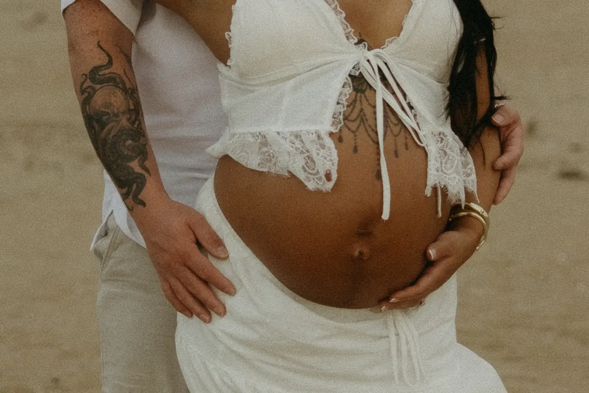 couples maternity photoshoot on fort story beach in Virginia Beach, Virginia