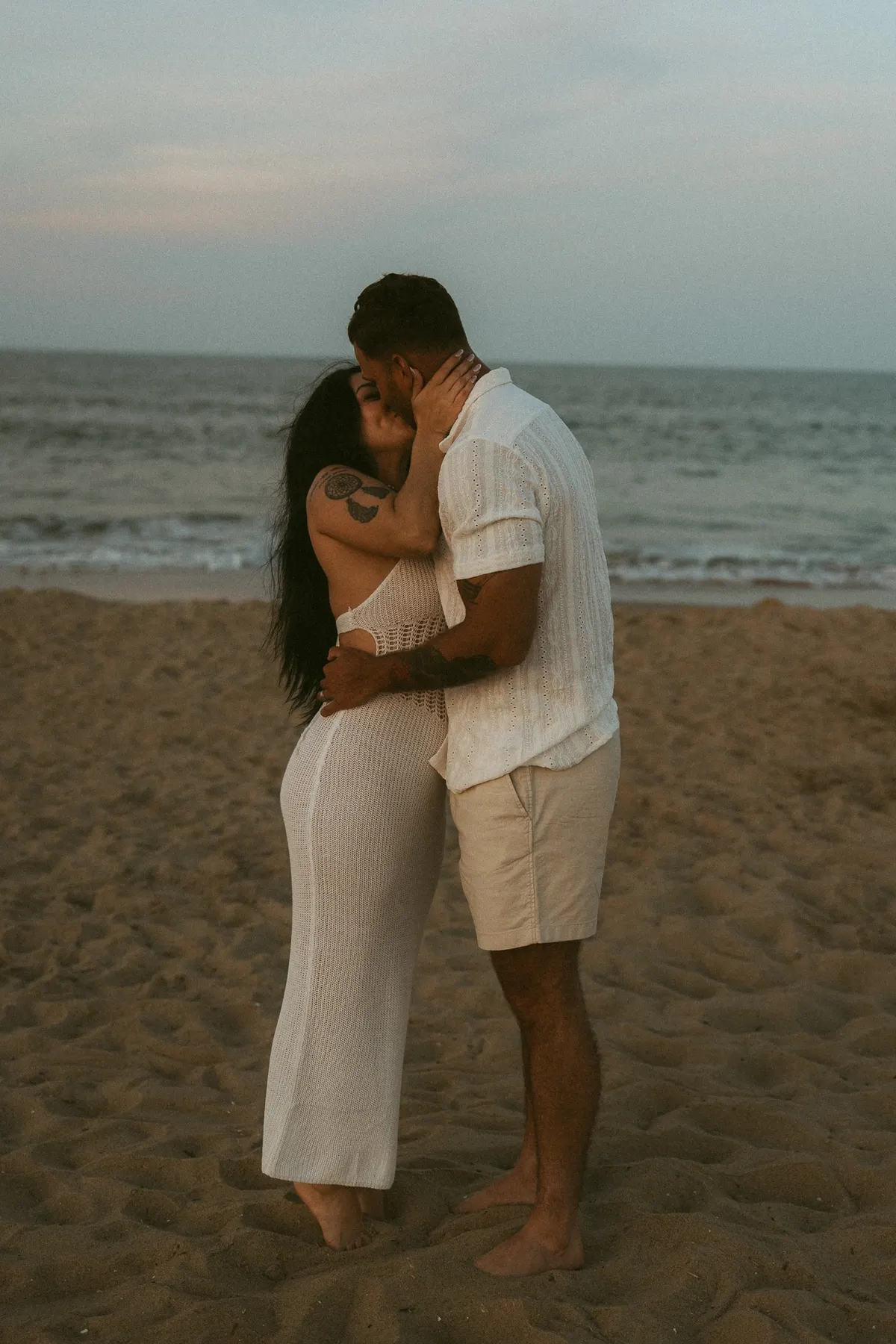 Bride and groom on Fort story beach in Virginia Beach, Va